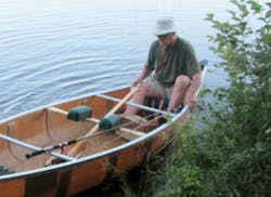 Niles Schulz, departing in his canoe Tuesday, the day he died.