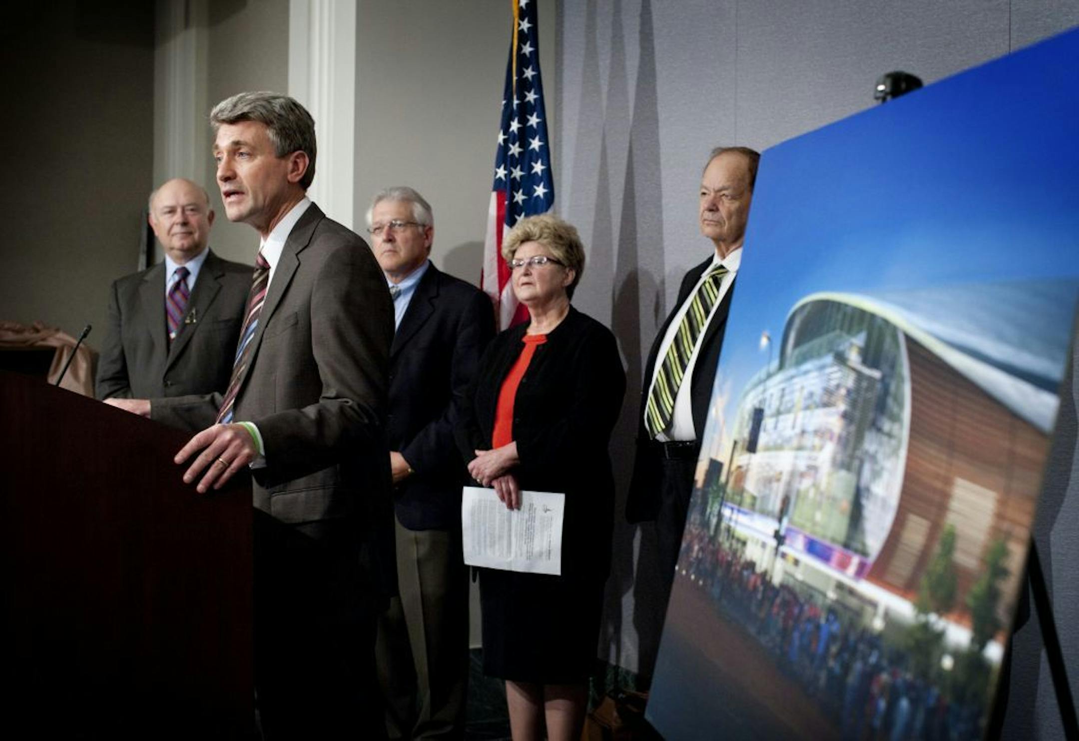 In July, Minneapolis Mayor R.T. Rybak spoke at a news conference about a proposed Vikings stadium plan and Target Center renovation. L to R behind him are Sam Grabarski, president and CEO Minneapolis Downtown Council, Bill McCarthy, president Minneapolis Regional Labor Federation, city council president Barbara Johnson and Timberwolves owner Glen Taylor.