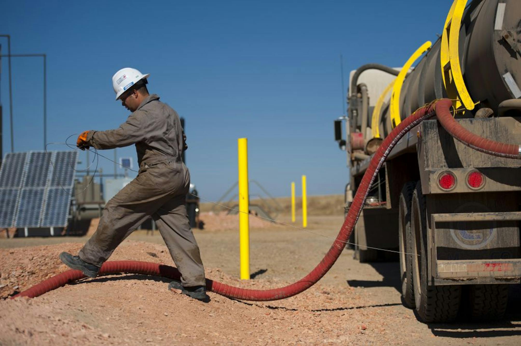 Kenny LeBaron of Minneapolis drove a truck with his younger brother Joshua. They moved to North Dakota to take advantage of higher salaries due to the oil boom.