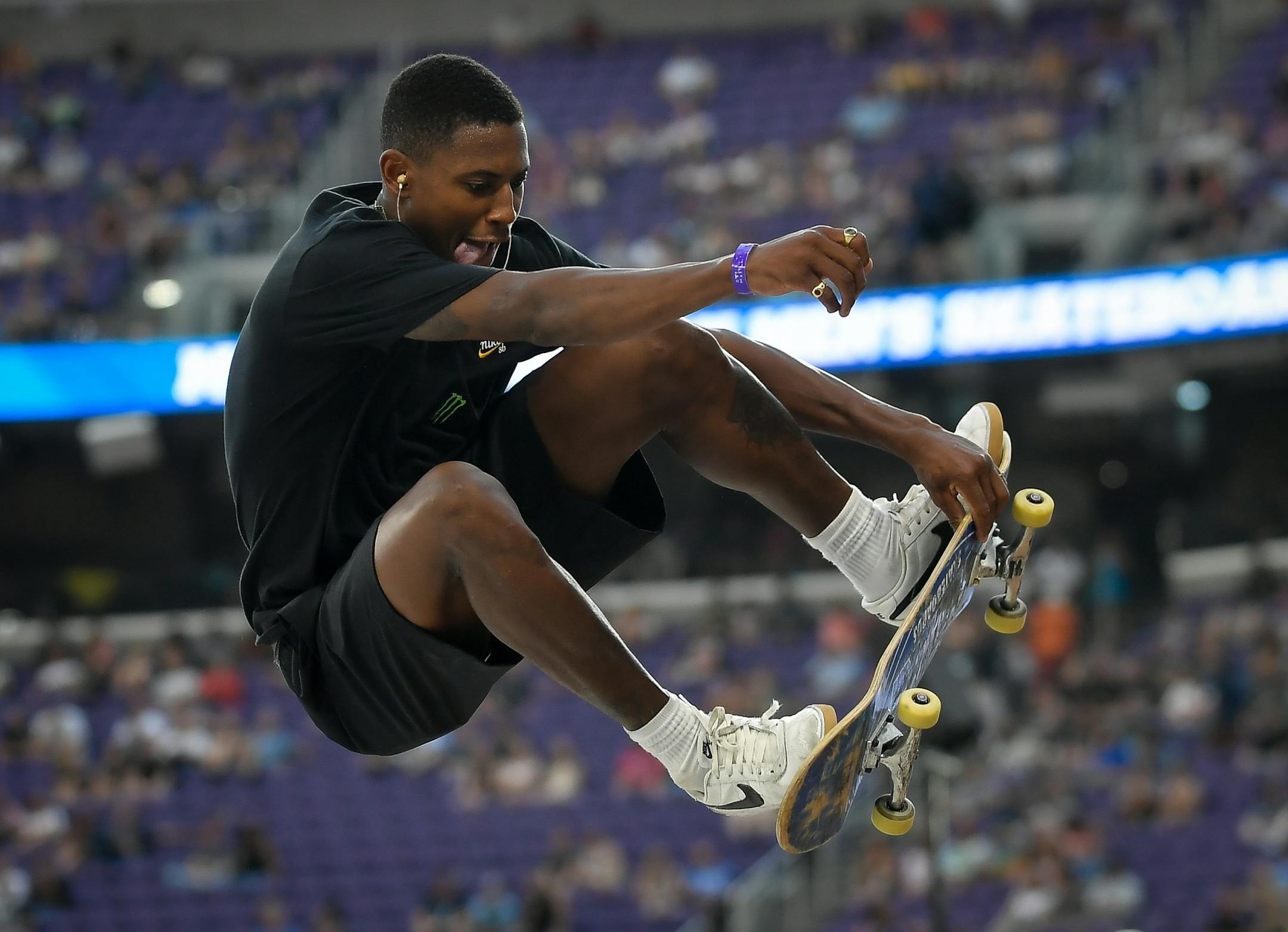Ishod Wair attempted a frontside indy grab during his thrid run in the skateboarding street finals Saturday.