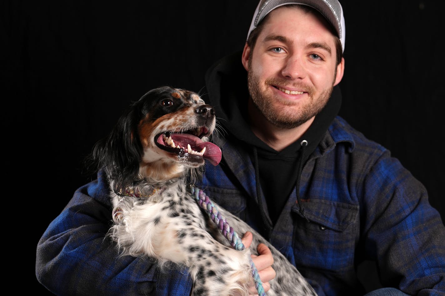 Sigrid, a 1-year-old Llewellin Setter and his owner Wyatt Luzinski of Woodbury, Minn. sit for a portrait ahead of the Bird Dog Parade during the National Pheasant Fest &amp; Quail Classic Friday, Feb. 17, 2023 at the Minneapolis Convention Center in Minneapolis. ] ANTHONY SOUFFLE • anthony.souffle@startribune.com