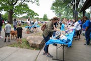 Church members spend the day eating, playing and talking together during a picnic at North Mississippi Regional Park, Saturday, Aug. 13, 2022 in Minne