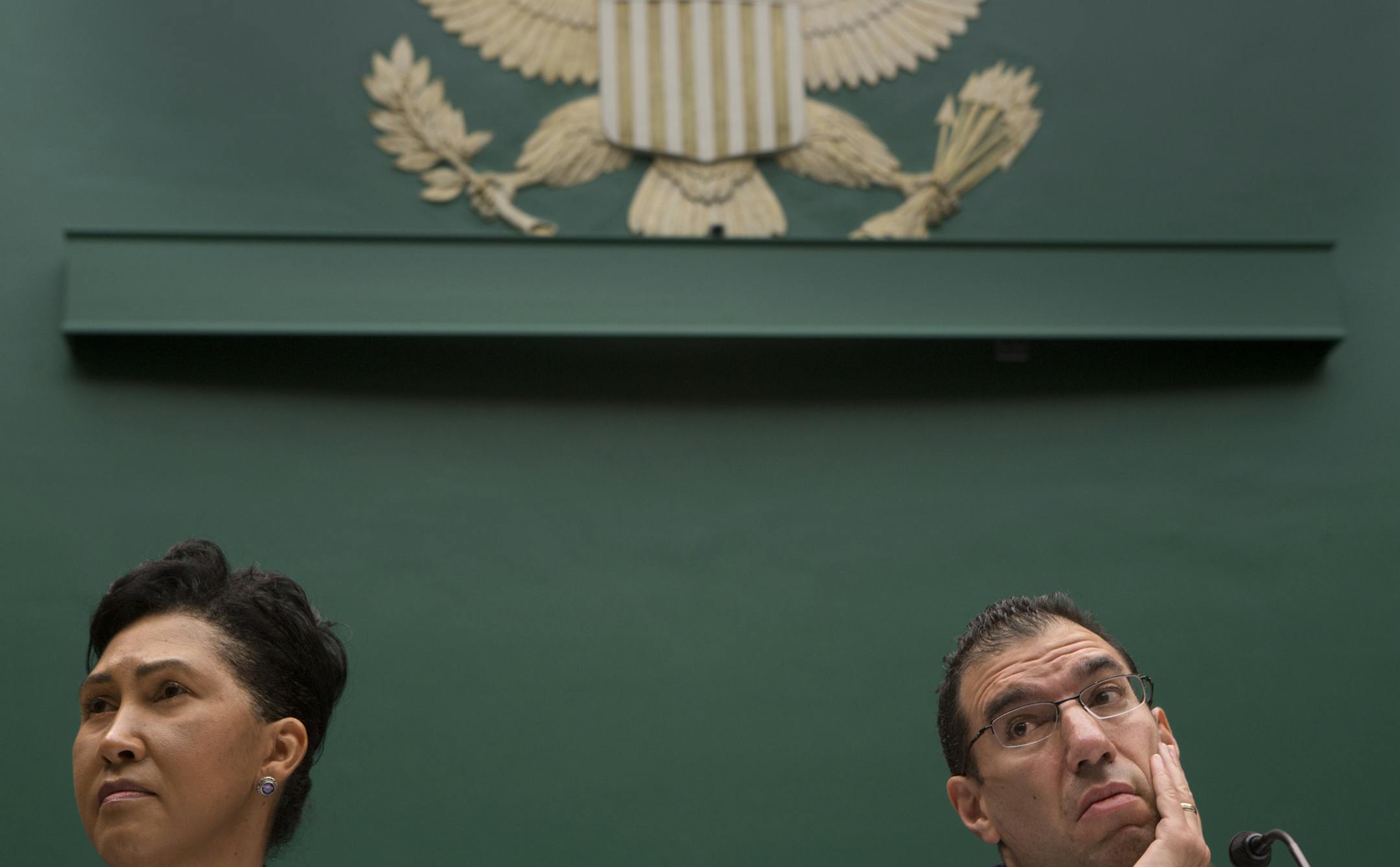 Cheryl Campbell, left, senior vice president of CGI Federal, and Andrew Slavitt, group executive vice president at Optum/QSSI, testify during a House Energy and Commerce Committee hearing on technical malfunctions surrounding the registration process for the Affordable Care Act at the Rayburn House Office Building on Capitol Hill in Washington, Oct. 24, 2013.