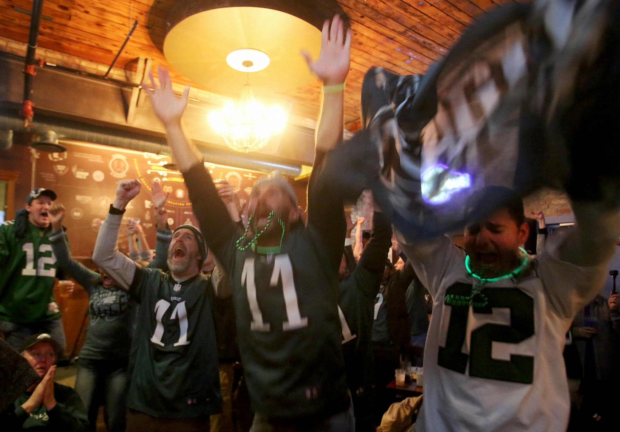 Philadelphia Eagles fans erupt in joy as they watched the waning moments of the game on TV's at the Town Hall Brewery during the Eagles 41-33 win over the New England Patriots Sunday, Feb. 4, 2018, in Minneapolis, MN.