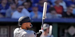 The Twins' Carlos Correa slugged an RBI double during the third inning against the Royals on Opening Day in Kansas City on Thursday.