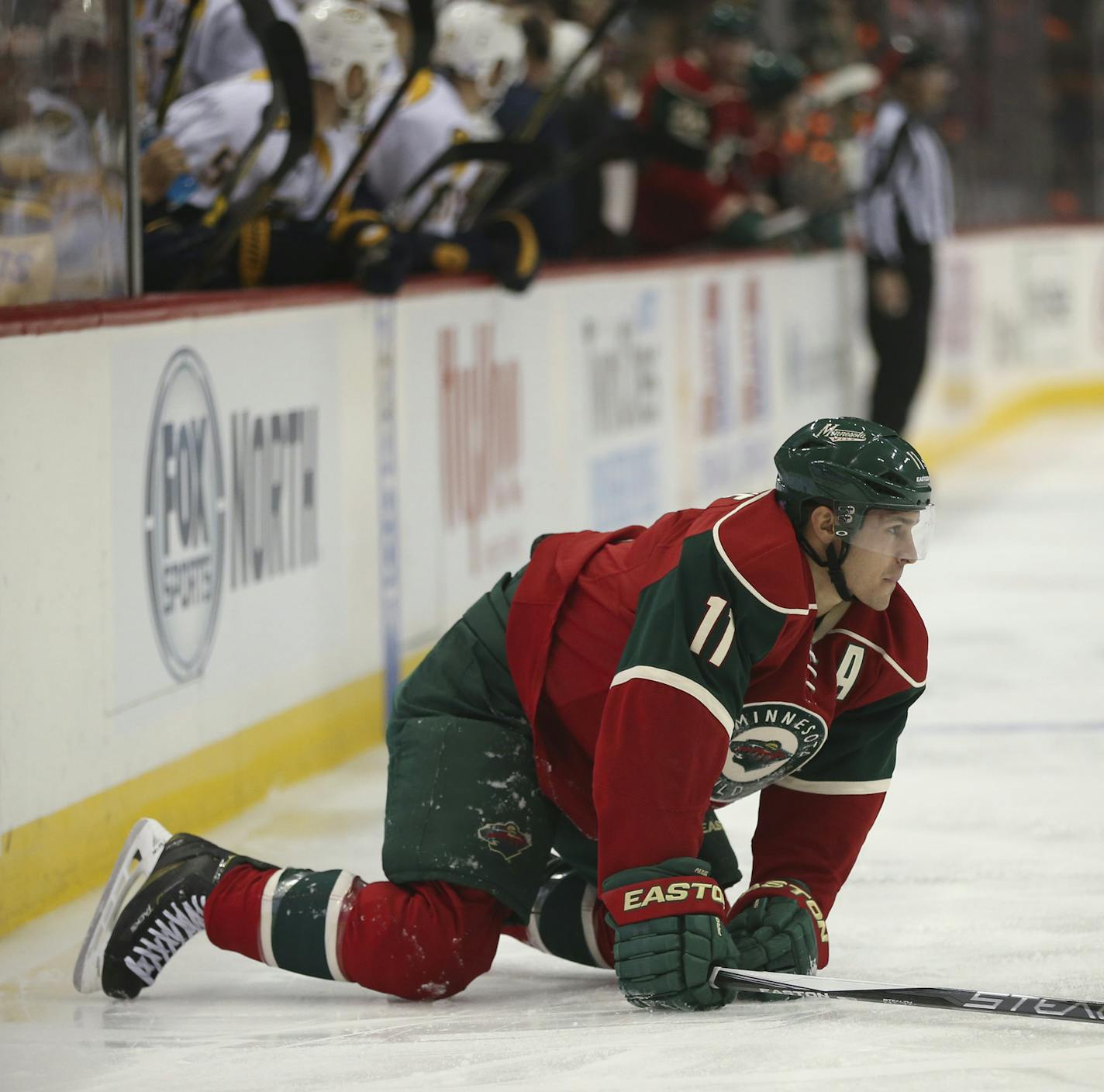 Wild left wing Zach Parise (11) struggled to get to his feet after a hit into the boards in the first period Thursday night. ] JEFF WHEELER &#xef; jeff.wheeler@startribune.com The Minnesota Wild faced the Nashville Predators in an NHL hockey game Thursday night, November 5, 2015 at Xcel Energy Center in St. Paul.