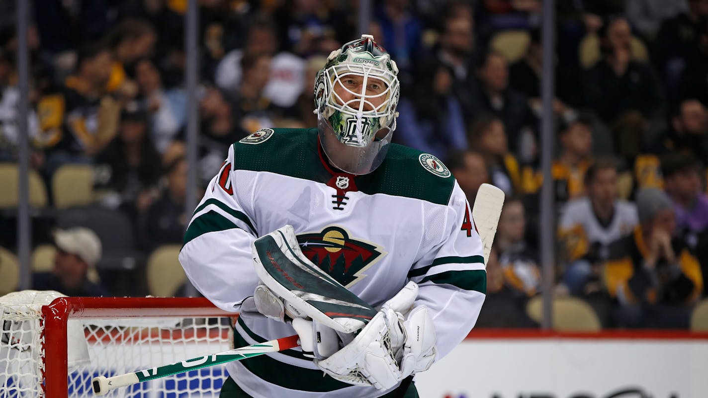 Minnesota Wild goaltender Devan Dubnyk takes a timeout during the second period of an NHL hockey game against the Pittsburgh Penguins in Pittsburgh, Tuesday, Jan. 14, 2020. (AP Photo/Gene J. Puskar)