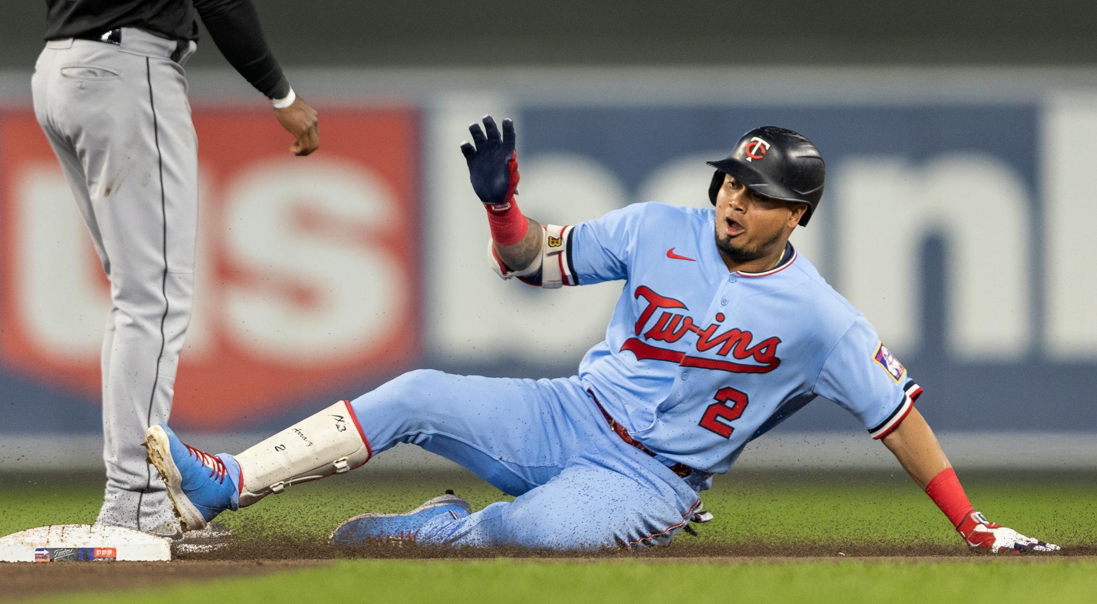 Luis Arraez of the Minnesota Twins slides safely into second base in the third inning.