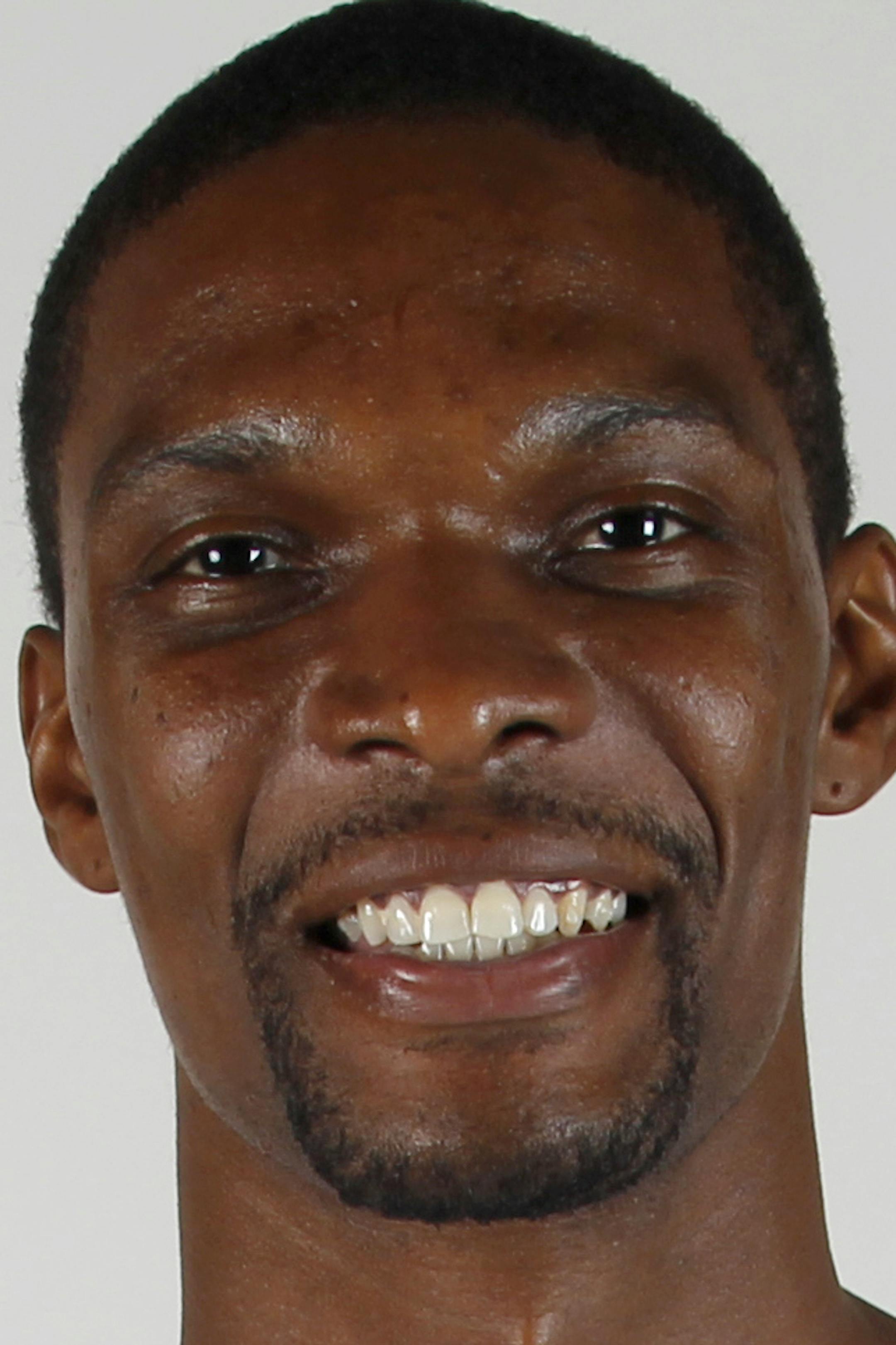 Miami Heat forward Chris Bosh poses for a photo during the Heat's Media Day, Friday, Sept. 28, 2012 in Miami. (AP Photo/Wilfredo Lee) ORG XMIT: NYOTK