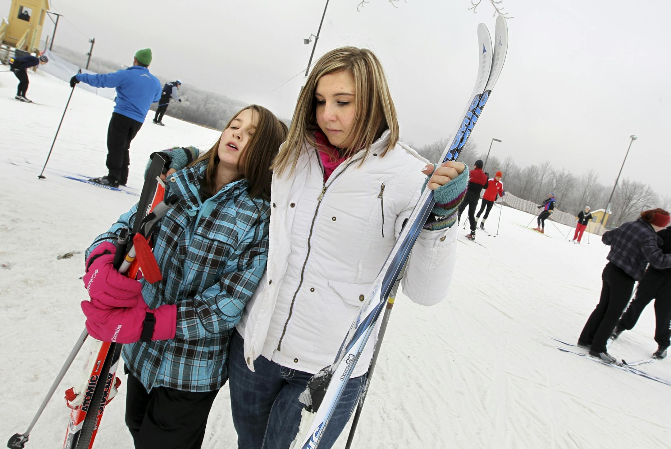 Jen Emmett, right, of Minneapolis walks her niece Kenzie Wolff, 11, of Champlin back to the Chalet after cross country skiing at Elm Creek Park Reserve in Maple Grove February 4, 2012. Emmett finds that the acronym PANK applies to her: Professional Aunt No Kids.