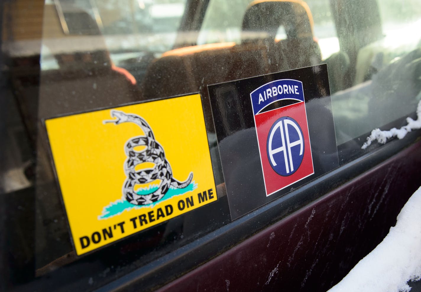 The back window of Novak&#x2019;s truck outside his home in Maplewood.