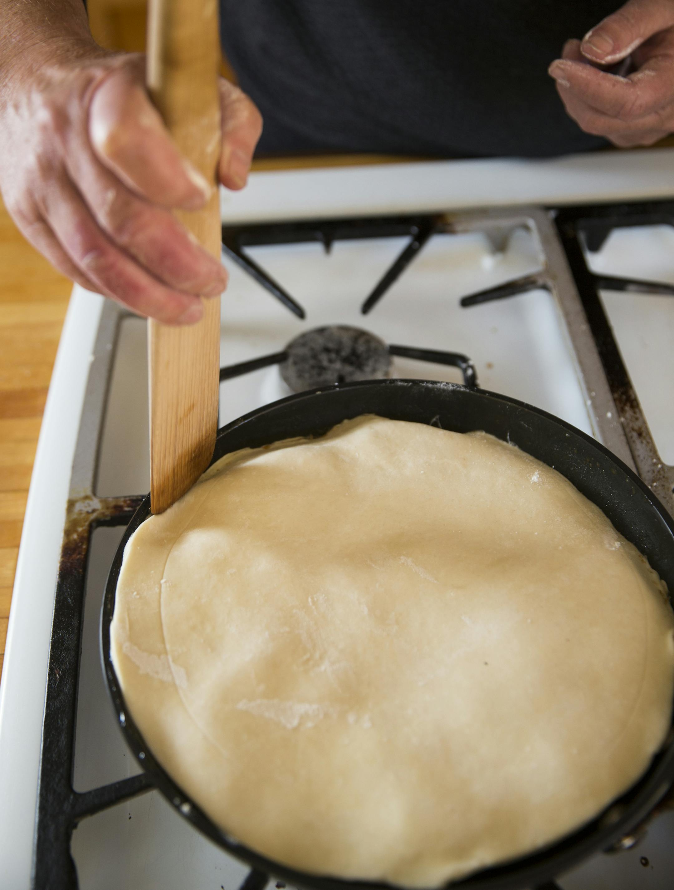 Place the dough over the apples and bake. Baking Central makes Apple Tarte Tatin. ] (Leila Navidi/Star Tribune) leila.navidi@startribune.com BACKGROUND INFORMATION: Baking Central makes Tarte Tatin for apple season, with an easy, flaky pastry on Thursday, October 13, 2016.