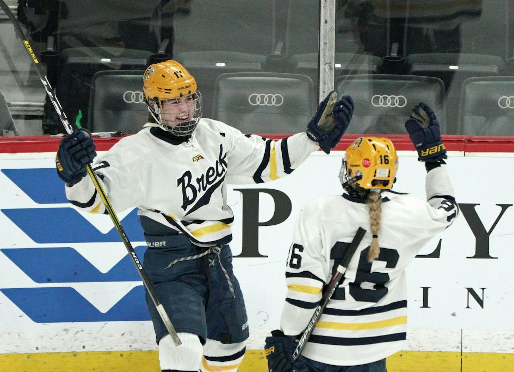 Breck School's Olivia Mobley and Ally Qualley celebrate Qualley's 2nd period goal during Froday's victory over Rochester Lourdes.