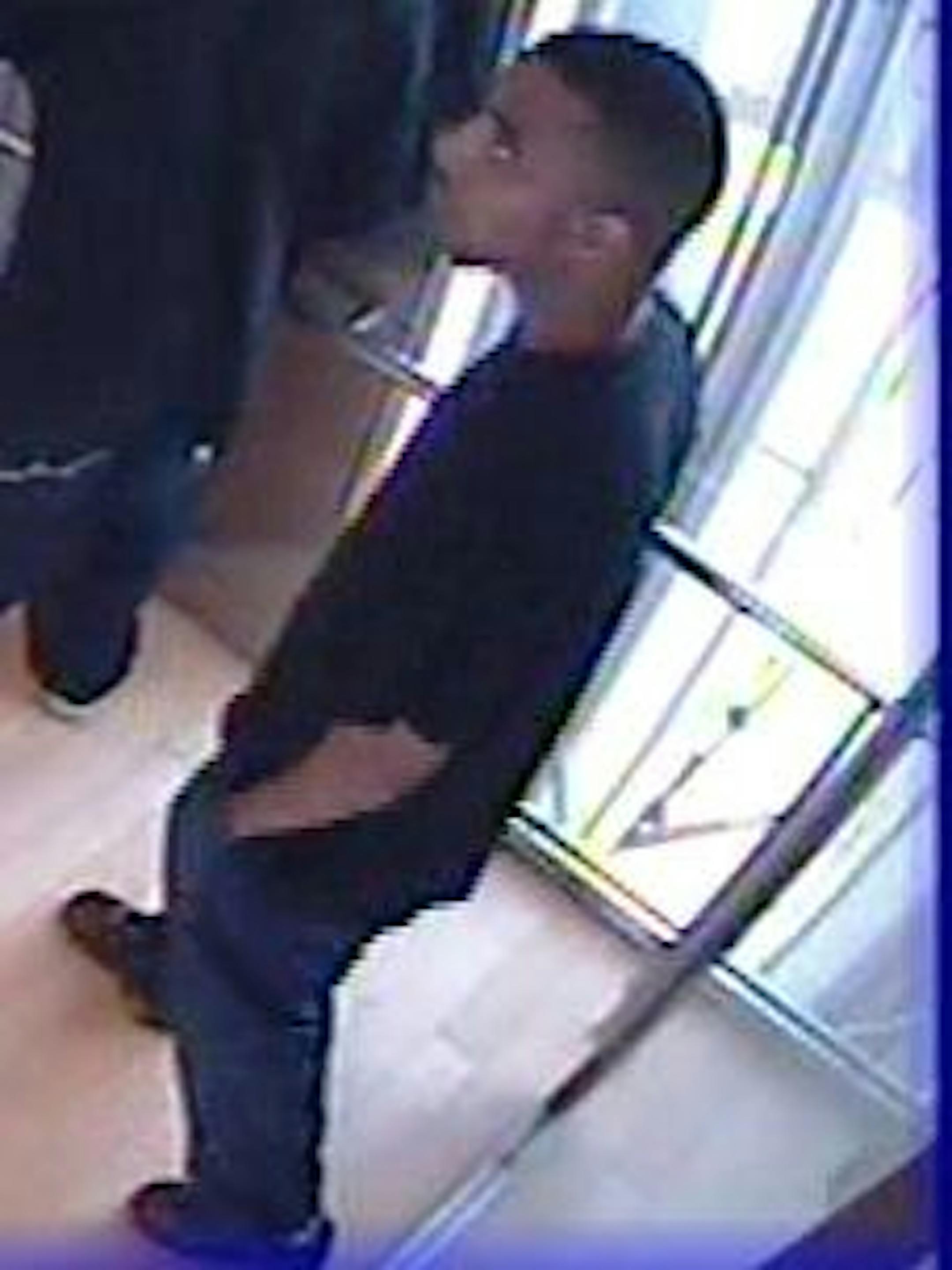 Police are seeking help in identifying this man, suspected of shooting a library patron in the back.