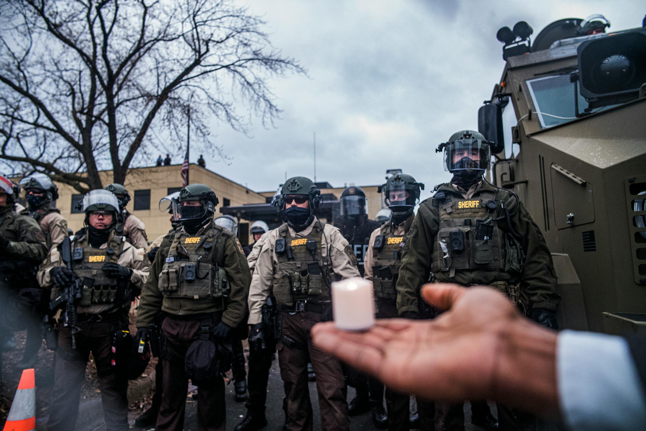 People protest near the Brooklyn Center Police Department in response to the fatal police shooting of Daunte Wright, Wednesday, April 14, 2021 in Brooklyn Center, Minn. Former Brooklyn Center police officer Kimberly Potter was charged with second degree manslaughter after the shooting.