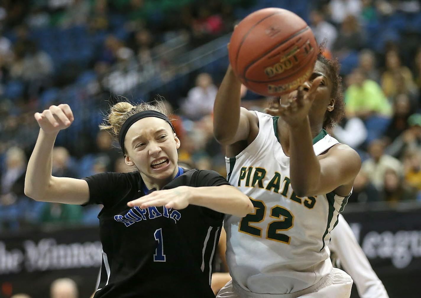 Hopkins' Paige Bueckers (left), battled for a loose ball with Park Center's Mikayla Hayes in the Class 4A girls' basketball quarterfinals last March. Bueckers is off to a fast start this season.