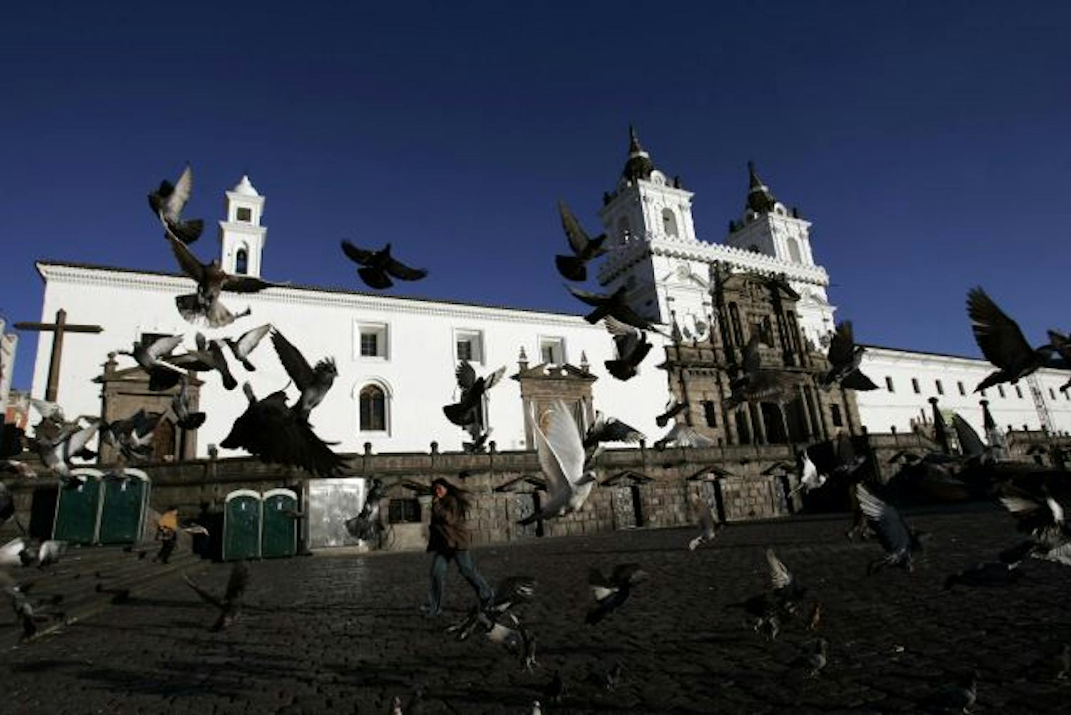 Pigeons flew in San Francisco Square in Quito, the first stop on Country Walker's hiking trip through the Ecuadorean Highlands. The Church of San Francisco was built in 1536 shortly after the founding of Quito.
