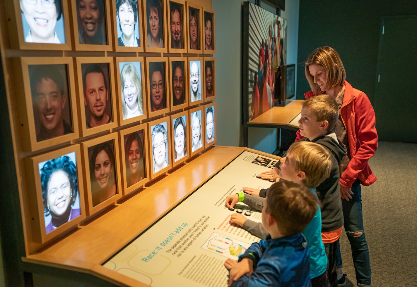 Theresa Plaunt brought sons Owen, 7, and Austin, 5, and her nephew Gavin Neilser, 5, to the Science Museum of Minnesota. Here they explored the "RACE: Are We So Different?" exhibition.