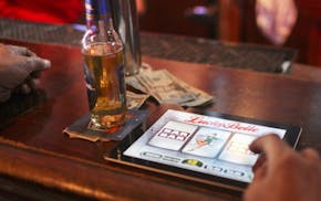 Dave Stokes of St. Paul plunked down 20 dollars to try his luck at electronic pulltabs and in 20 minutes had almost 50 dollars in winning pulls and st