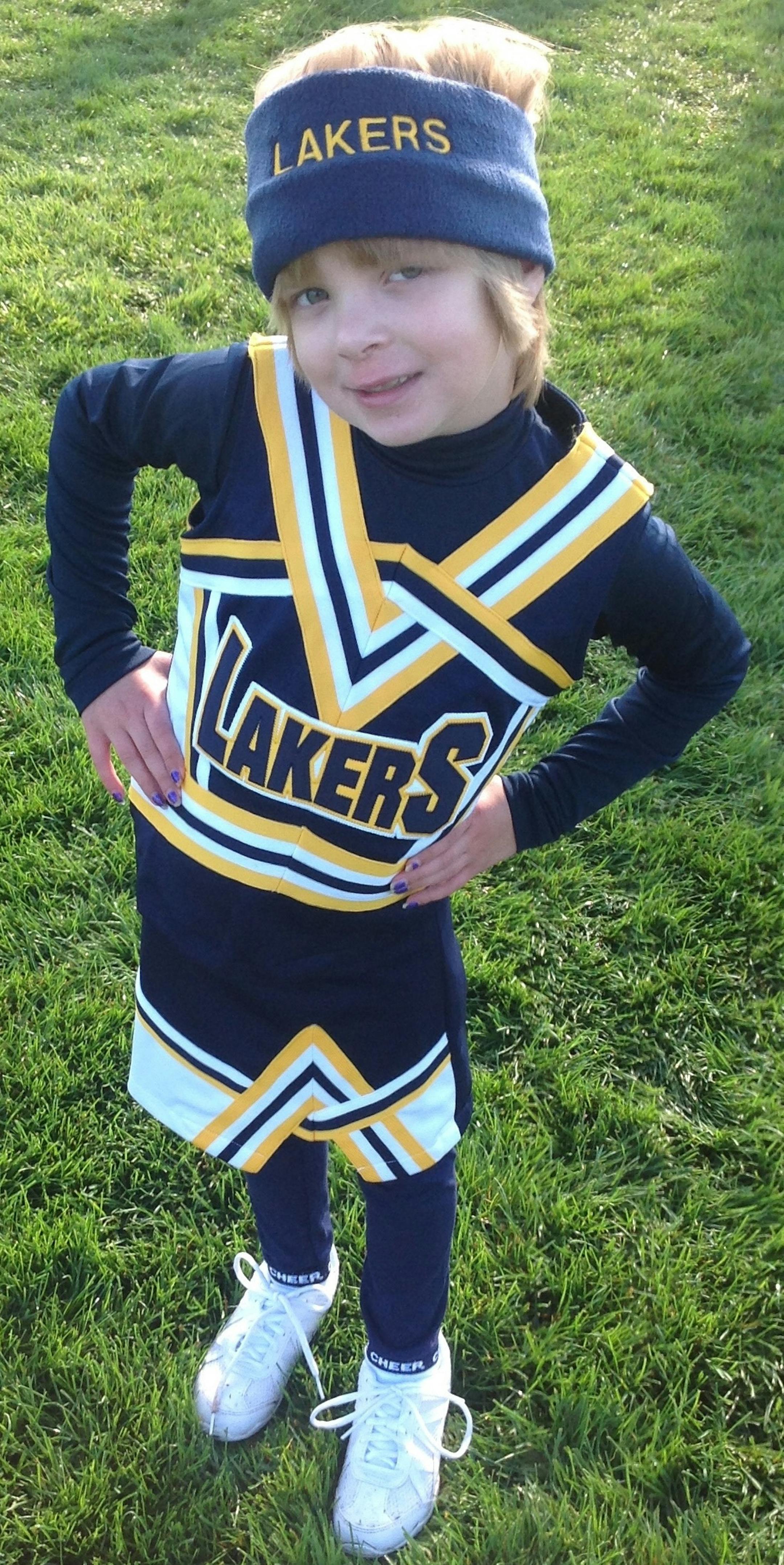 Emily cheering shortly after a chemo infusion.