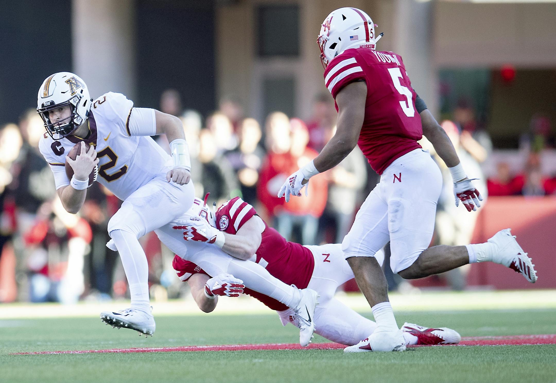 Minnesota's quarterback Tanner Morgan ran for a first down during the third quarter as Minnesota took on Nebraska at Memorial Stadium, Saturday, October 20, 2018 in Lincoln, NE.