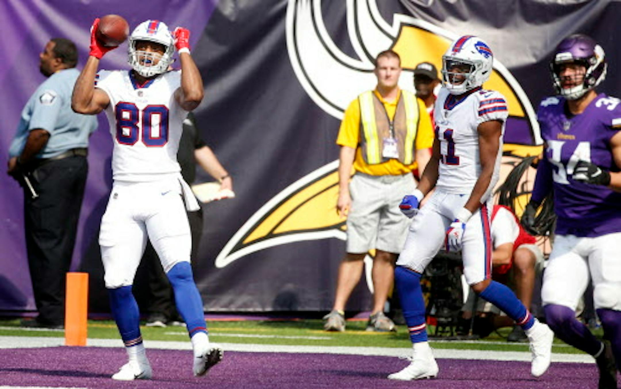 Buffalo Bills tight end Jason Croom (80) celebrates after catching a 26-yard touchdown pass during the first half of an NFL football game against the Minnesota Vikings, Sunday, Sept. 23, 2018, in Minneapolis. (AP Photo/Bruce Kluckhohn)