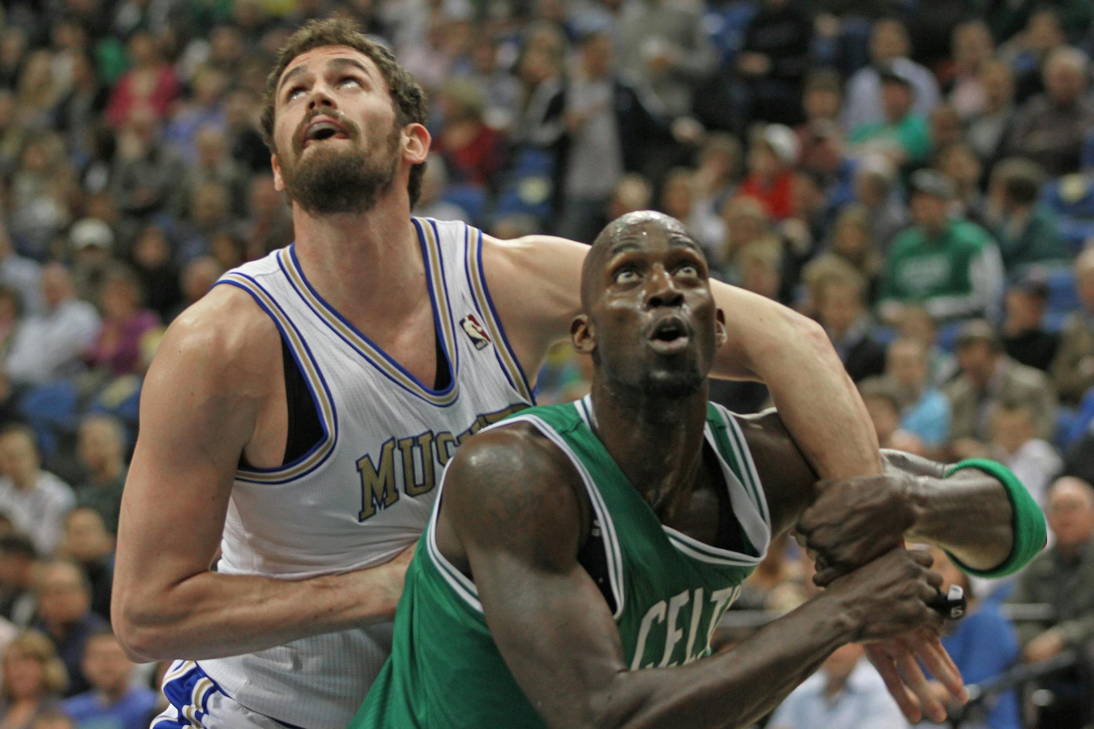 Minnesota Timberwolves vs. Boston Celtics, Target Center, 3/30/12. (left to right) Minnesota's Kevin Love and Boston's Kevin Garnett battled under the basket.] Bruce Bisping/Star Tribune, bbisping@startribune.com ORG XMIT: MIN2013062619422269