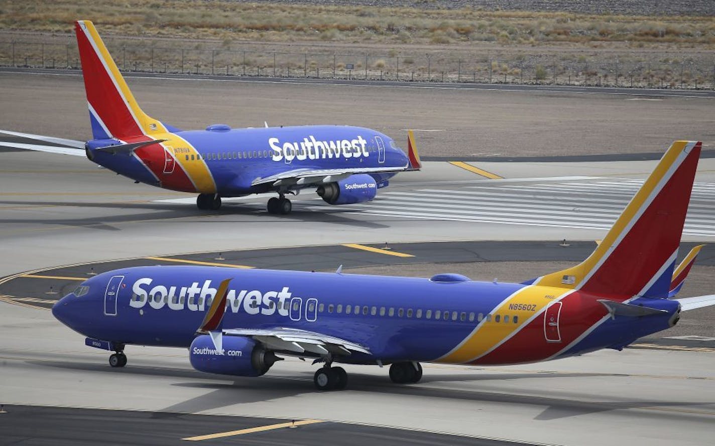 FILE - This Wednesday, July 17, 2019 file photo shows Southwest Airlines planes at Phoenix Sky Harbor International Airport in Phoenix. The Transportation Department's inspector general said in a report Tuesday, Feb. 11, 2020 that Southwest Airlines continues to fly airplanes with safety concerns, putting 17 million passengers at risk, while federal officials do a poor job overseeing the airline.