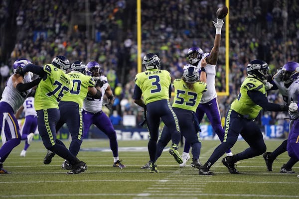 Seahawks quarterback Russell Wilson had a pass batted down when the Vikings and Seattle played last season.