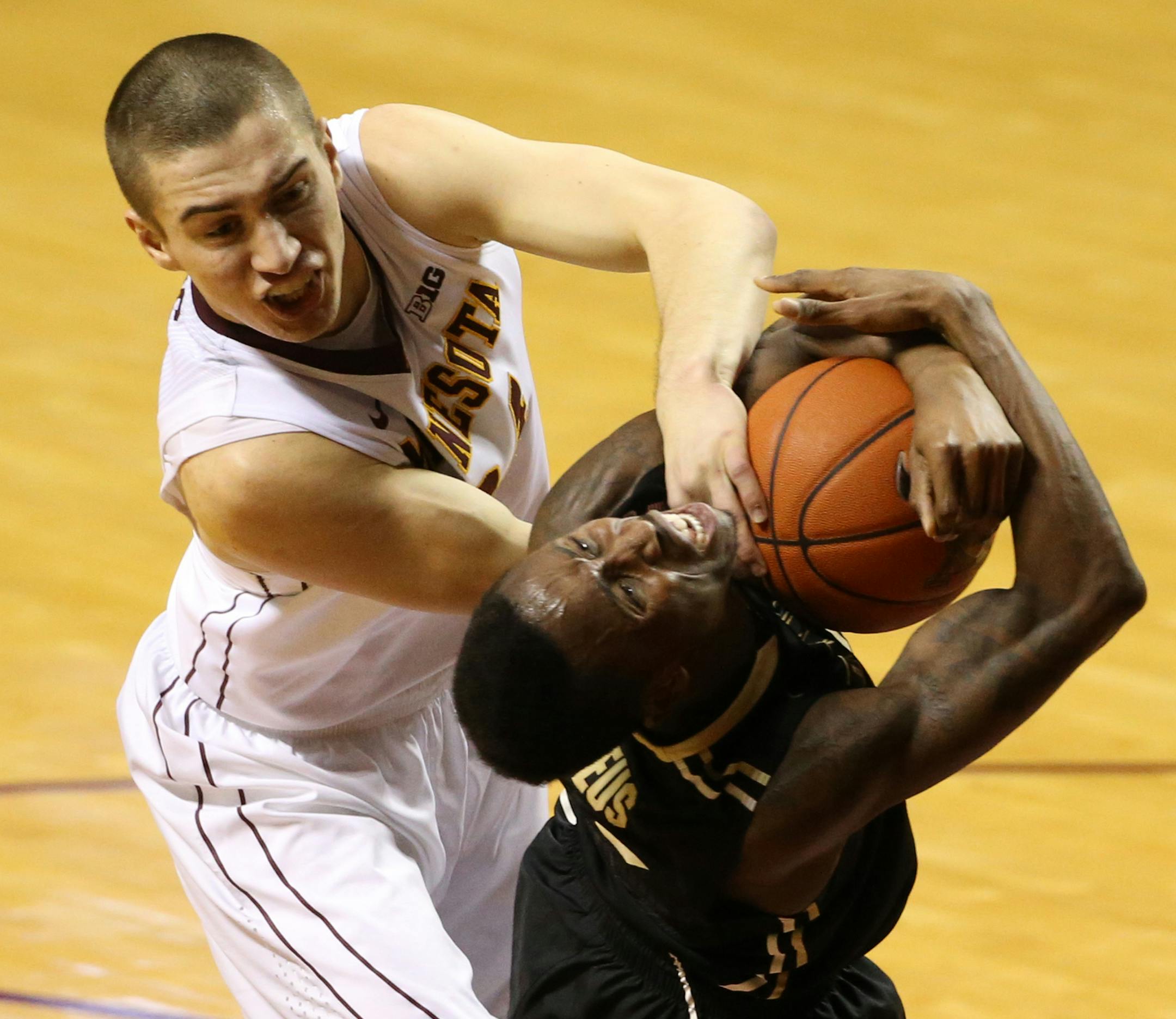 Gophers forward Joey King, left, called being outrebounded 41-28 by D-II Southwest Minnesota State in an exhibition game a &#x201c;red flag.&#x201d; All five U players on the floor will need to hit the boards.