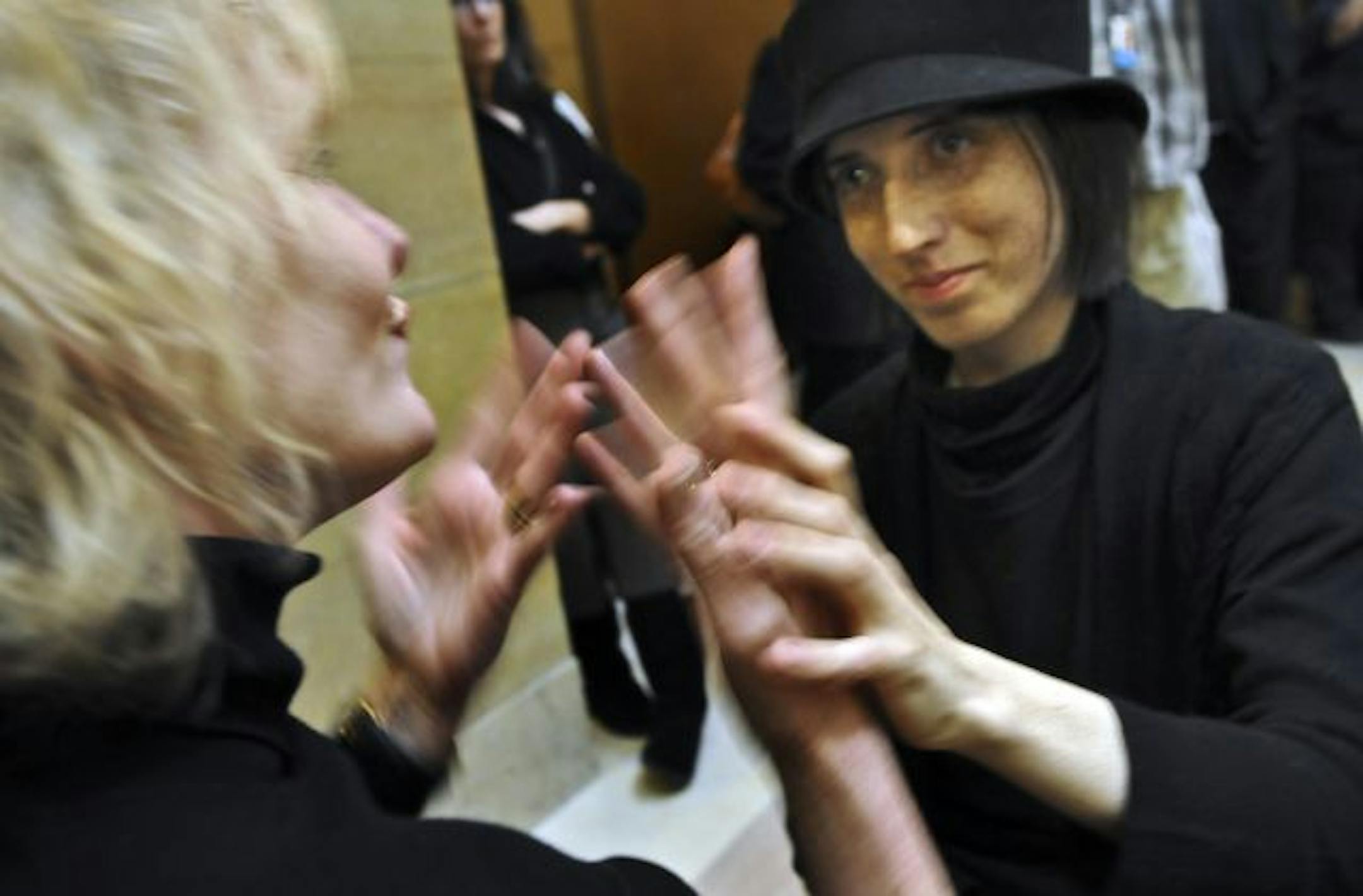 Interpreter Lisa Sindt, left, and Jamie Taylor attended a program honoring people who have served the deaf and hard of hearing in St. Paul. .