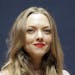 Hollywood actress Amanda Seyfried listens to a reporter's question during a press conference in Seoul, South Korea, Wednesday, Dec. 4, 2013. Seyfried 