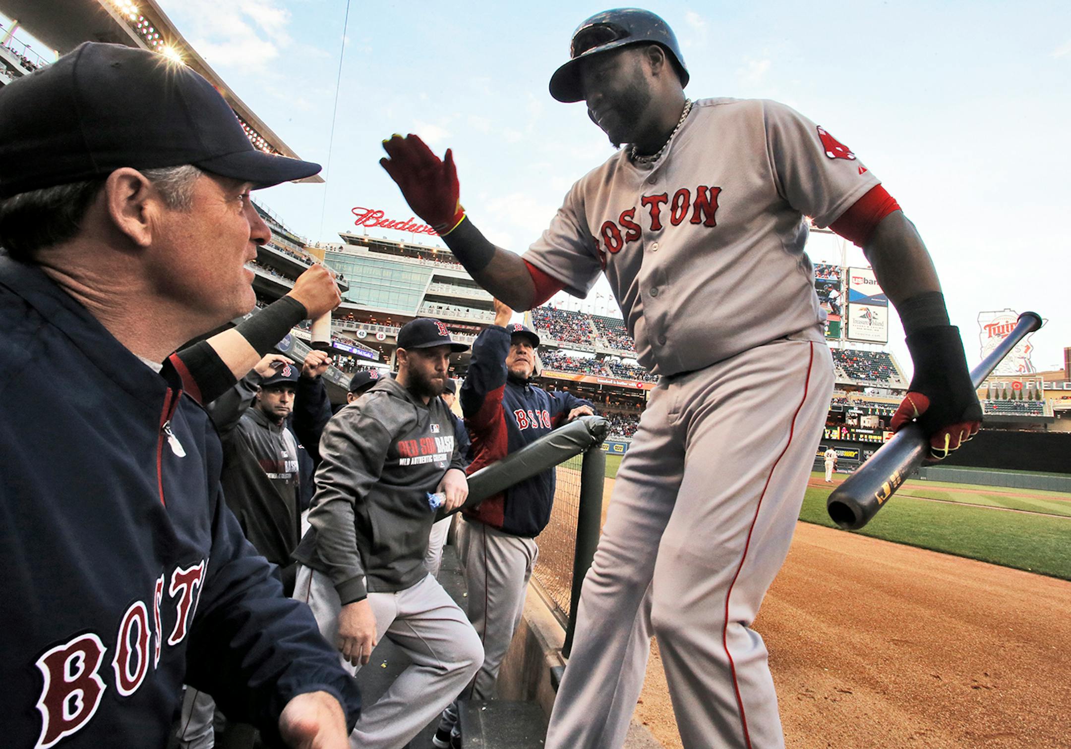 Red Sox including manager John Farrell, left, congratulated David Ortiz after he hit the first of his two home runs in the game - this in the 3rd inning. ] Minnesota Twins vs. Boston Red Sox (MARLIN LEVISON/STARTRIBUNE(mlevison@startribune.com)