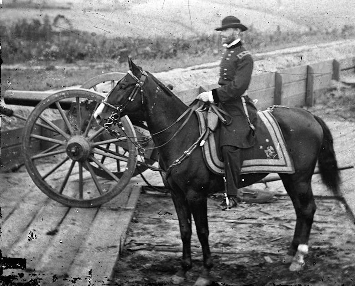 Photograph of the War in the West. These photographs are of Gen. William T. Sherman in Atlanta, September-November, 1864. After three and a half months of incessant maneuvering and much hard fighting, Sherman forced Hood to abandon the munitions center of the Confederacy. Sherman remained there, resting his war-worn men and accumulating supplies, for nearly two and a half months. During the occupation, George N. Barnard, official photographer of the Chief Engineer's Office, made the best documen