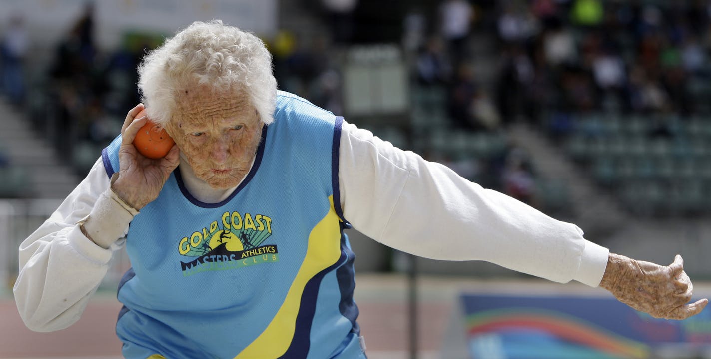 One hundred-year-old Ruth Frith of Australia competes in the women's shot put during the Masters Games, in Sydney, Australia, Sunday, Oct. 11, 2009. (AP Photo/Rick Rycroft) ORG XMIT: XRR102