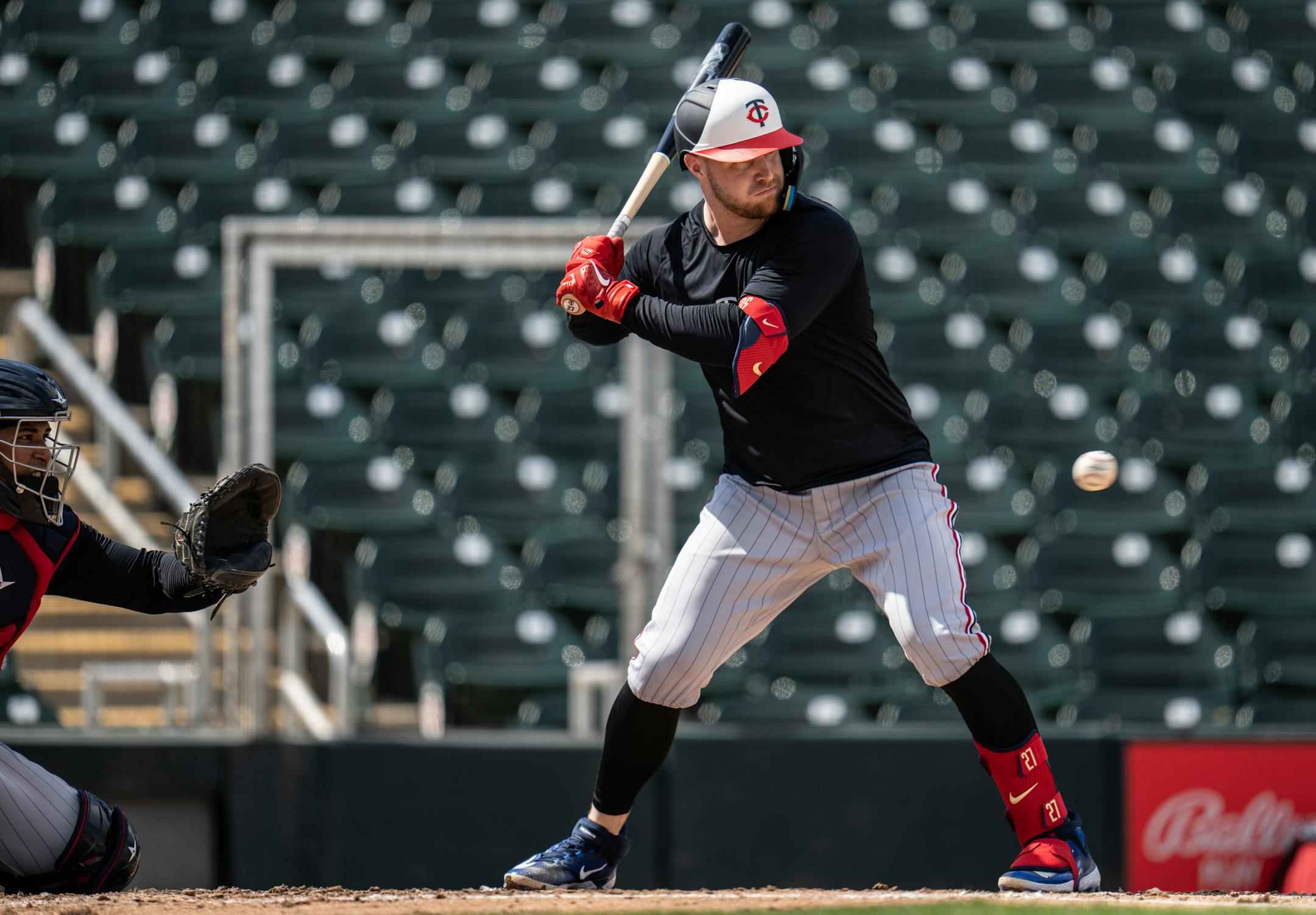 Minnesota Twins catcher Ryan Jeffers waits for a pitch during live batting practice.