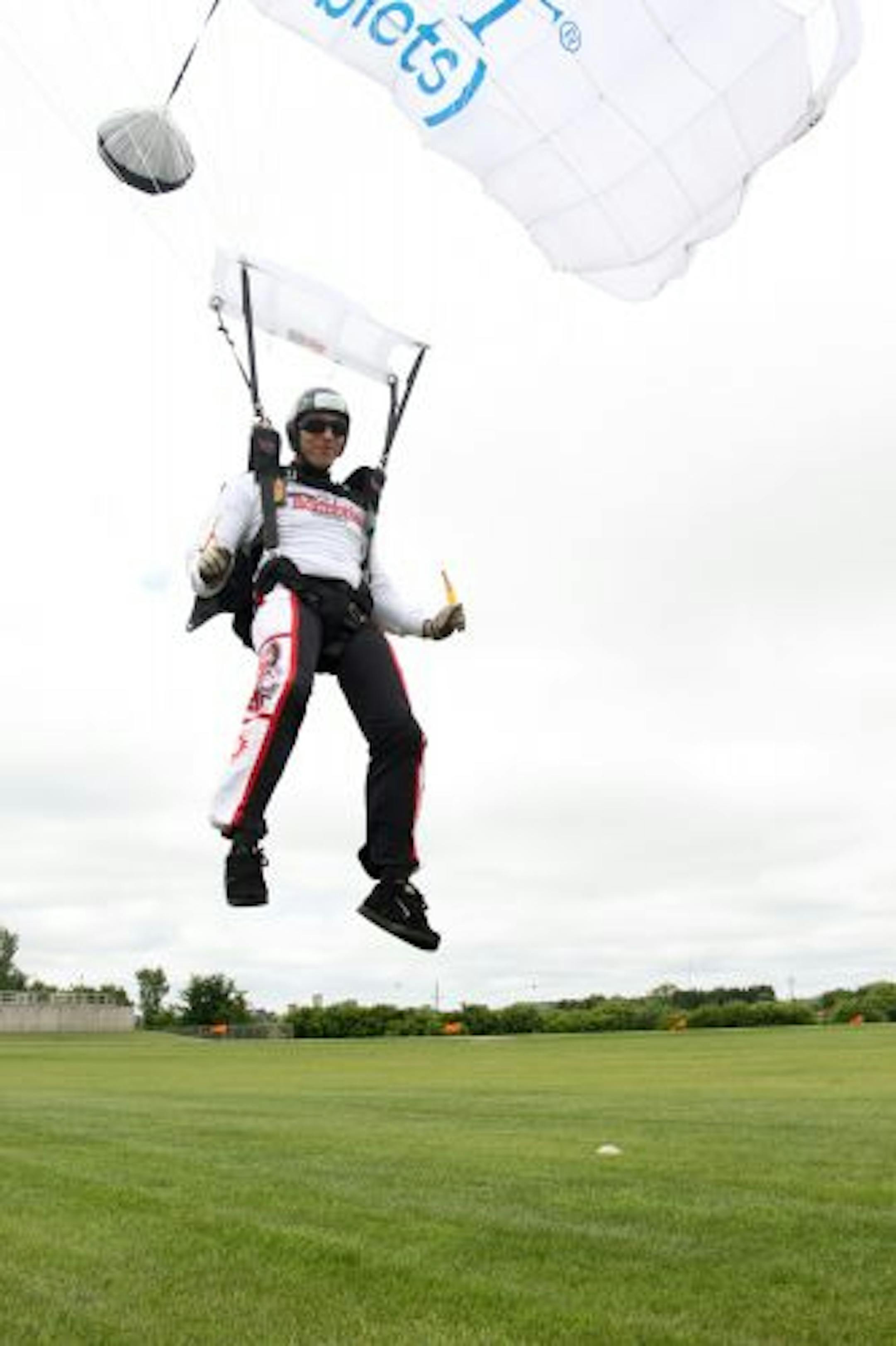Kevin Burkart's team assembled six parachutes to repack after each dive. In 2008, he completed 100 jumps in a similar event, but he raised his goal to 200 jumps this year.