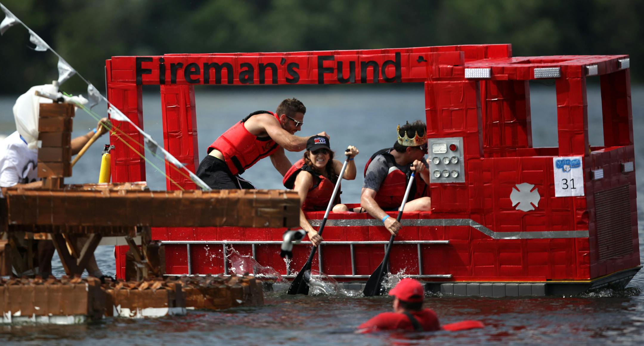 The Best Days of Summer Aquatennial Milk Carton Boat race was held Sunday afternoon at Thomas Beach on Lake Calhoun. ]The annual aquatennial continues through July 26th. MONICA HERNDON monica.herndon@startribune.com Minneapolis, MN 07/20/14 ORG XMIT: MIN1407201752011754