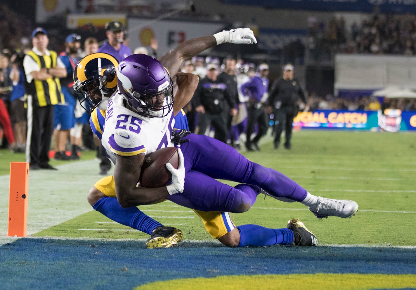 Vikings running back Latavius Murray scored on a two-point conversion over Los Angeles Rams cornerback Marcus Peters in third quarter at the L.A. Memorial Coliseum on Sept. 27.