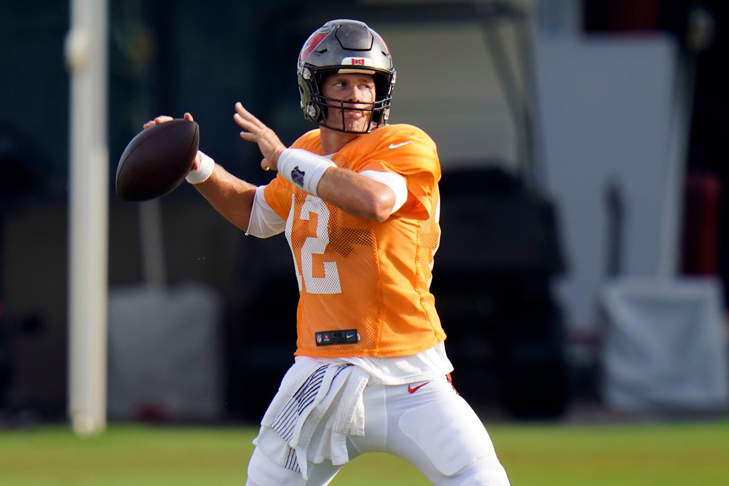 Tampa Bay Buccaneers quarterback Tom Brady (12) throws a pass during an NFL football training camp practice Monday, Aug. 17, 2020, in Tampa, Fla. (AP Photo/Chris O'Meara)