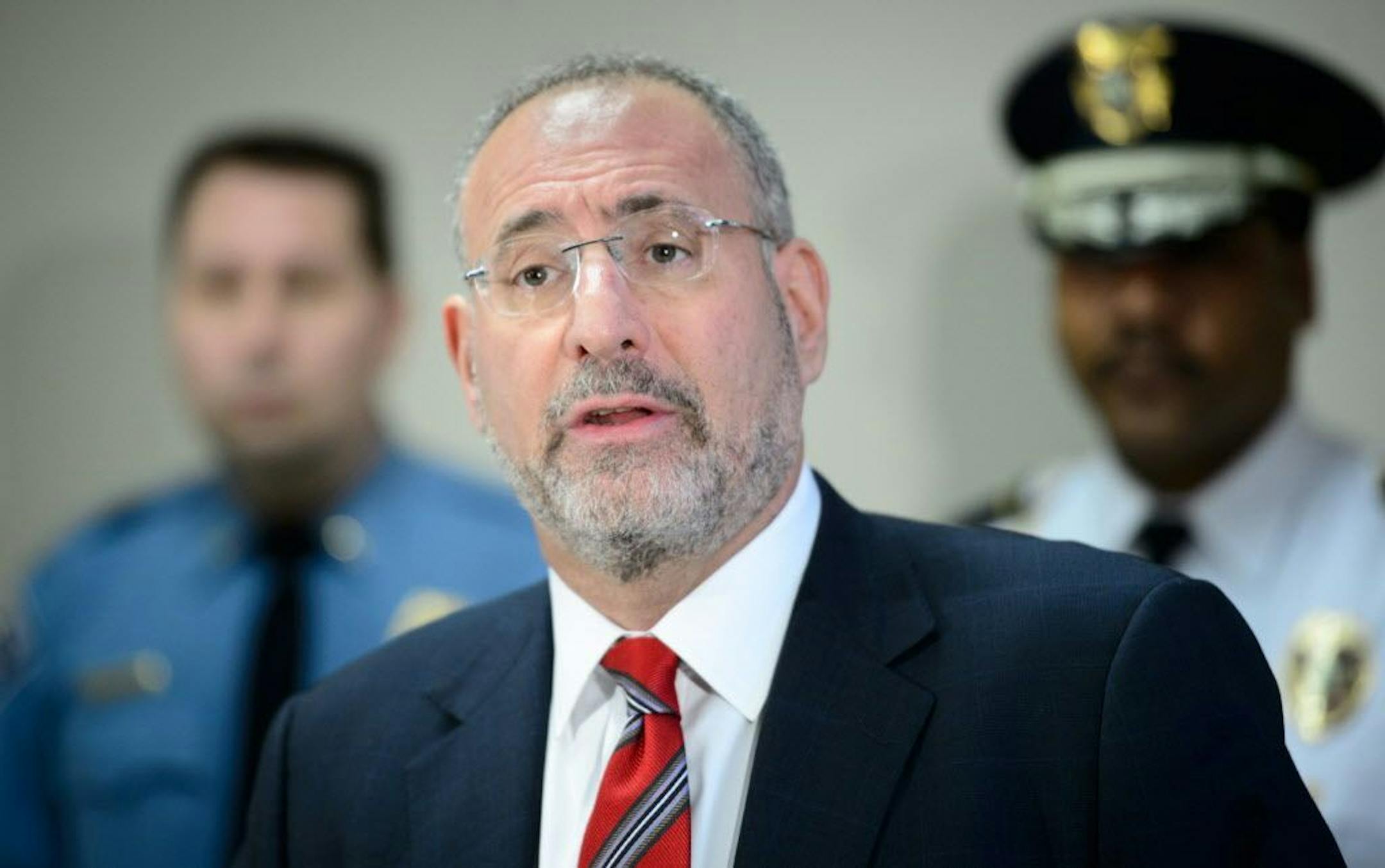 U.S. Attorney Andrew Luger announced federal drug trafficking charges against two north Minneapolis-based gangs.