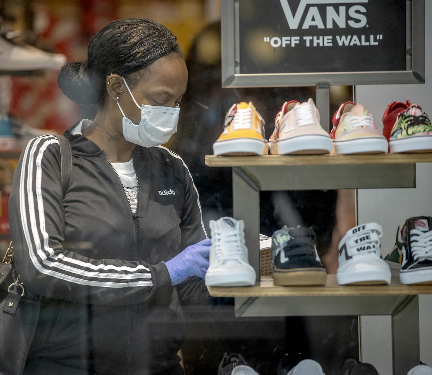 Shoppers made their way through Rosedale Center as some of the stores opened for business, Monday, May 18, 2020 in Roseville.