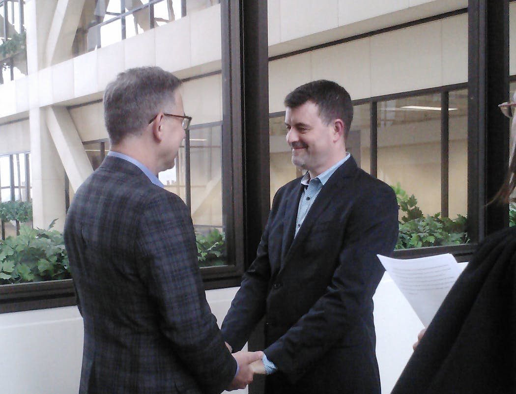 John Capecci, left, and Rob Kirby, got married at Hennepin County Government Center in October 2013.