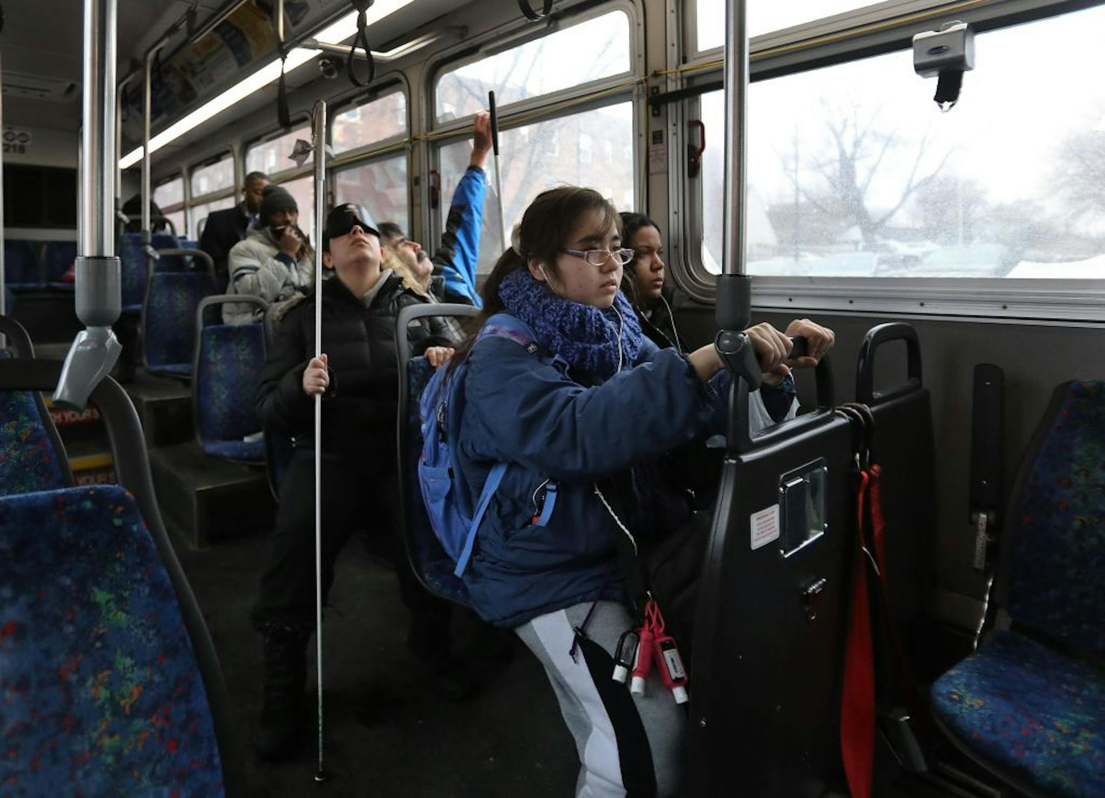 Through a class at Blind, Inc. Angie Castro, 30, is learning to navigate Minneapolis, including crossing busy streets around Blind, Inc. headquarters, near the Minneapolis Art Institute. Castro, middle, with cane, was out with Mark Erickson, cane travel instructor, familiarizing herself with the city and bus routes Thursday, March 5, 2020, in Minneapolis, MN.