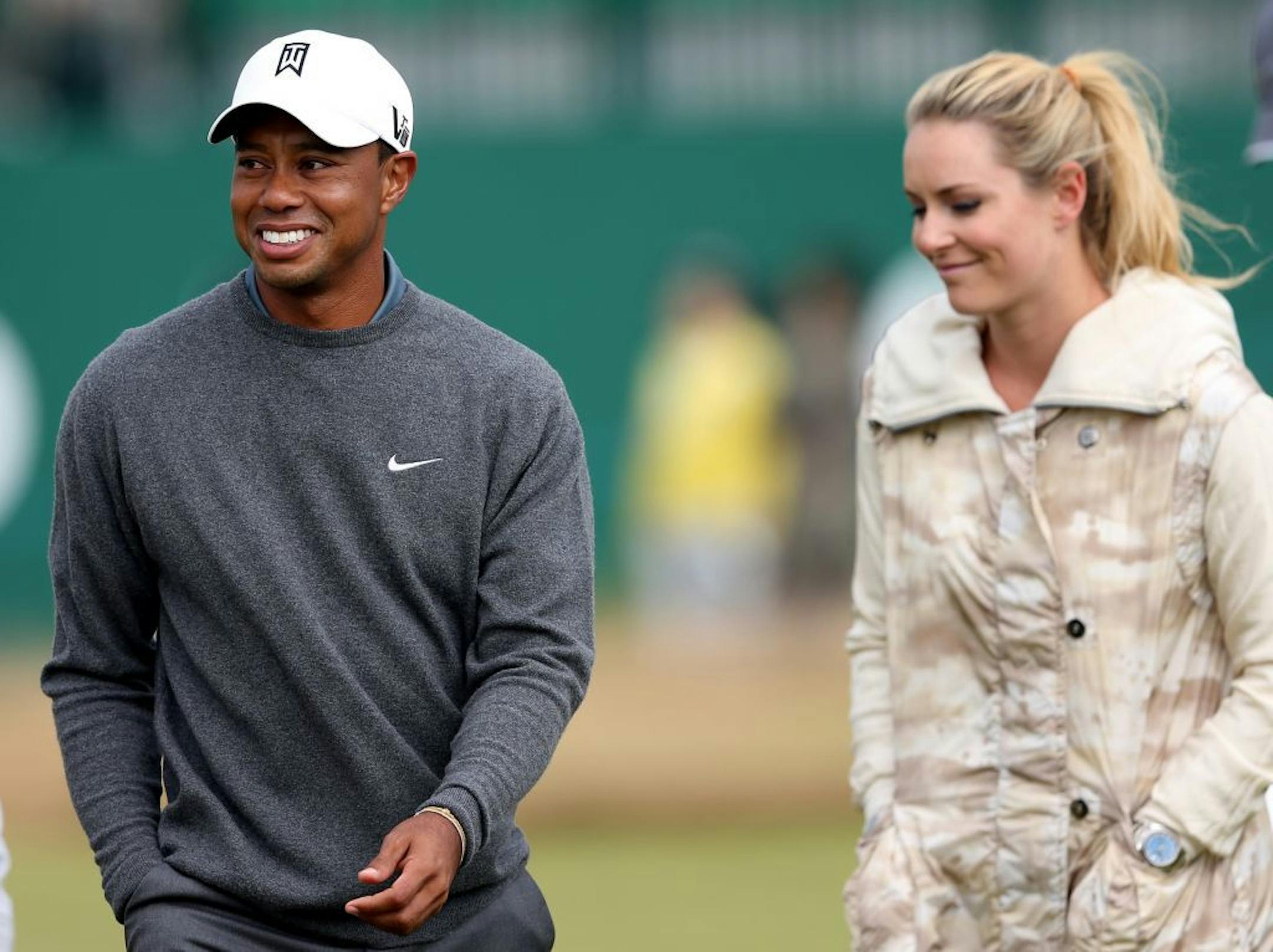 Tiger Woods and his girlfriend US skier Lindsey Vonn, are seen together during a practice round ahead of the British Open Golf Championship, Muirfield, Scotland, Monday, July 15, 2013. The British Open begins on Thursday, July 18.