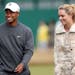 Tiger Woods and his girlfriend US skier Lindsey Vonn, are seen together during a practice round ahead of the British Open Golf Championship, Muirfield