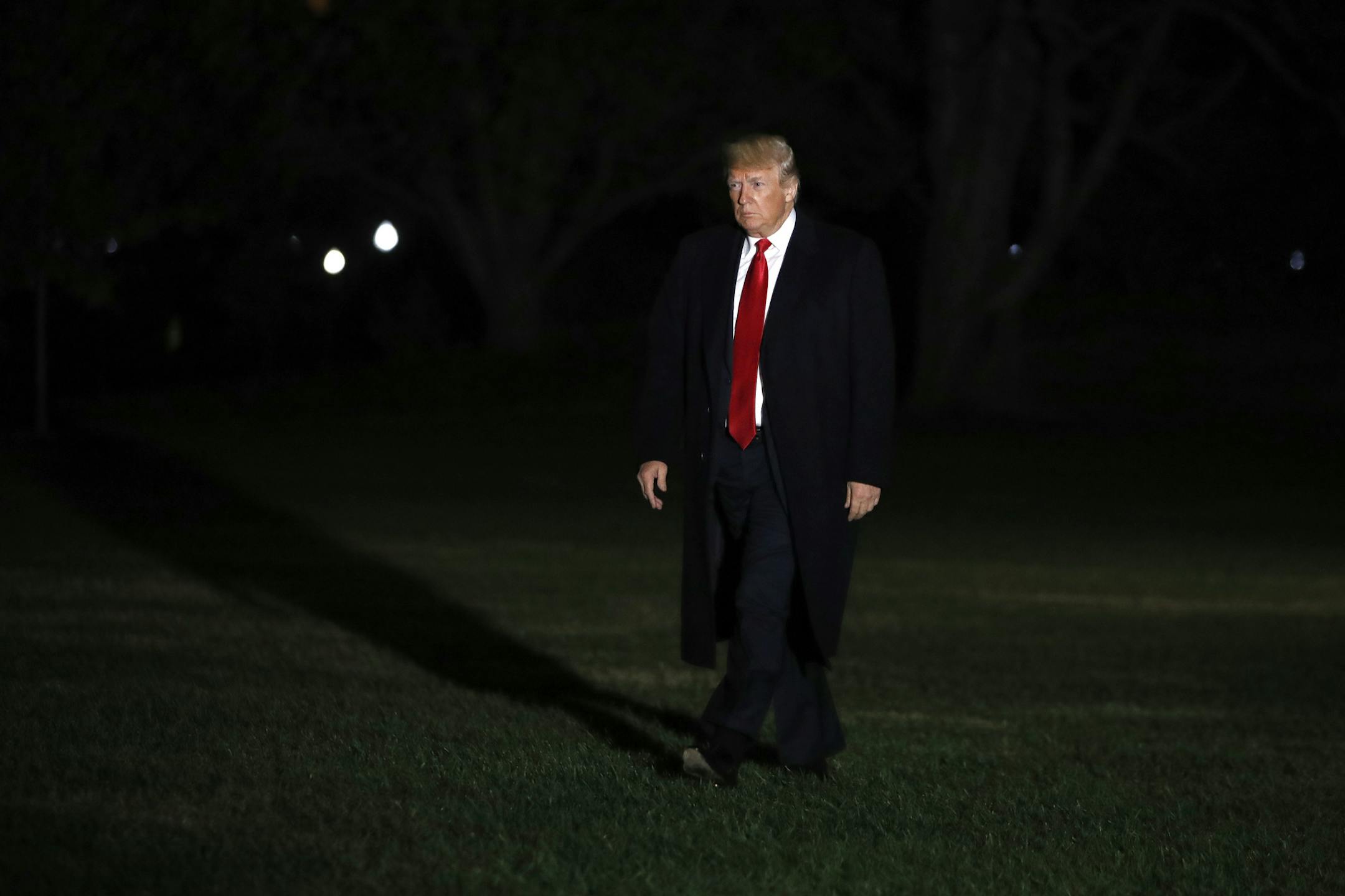 President Donald Trump returns to the White House, Sunday, Nov. 4, 2018, in Washington, after attending rallies in Macon, Ga., and Chattanooga, Tennessee. (AP Photo/Jacquelyn Martin)