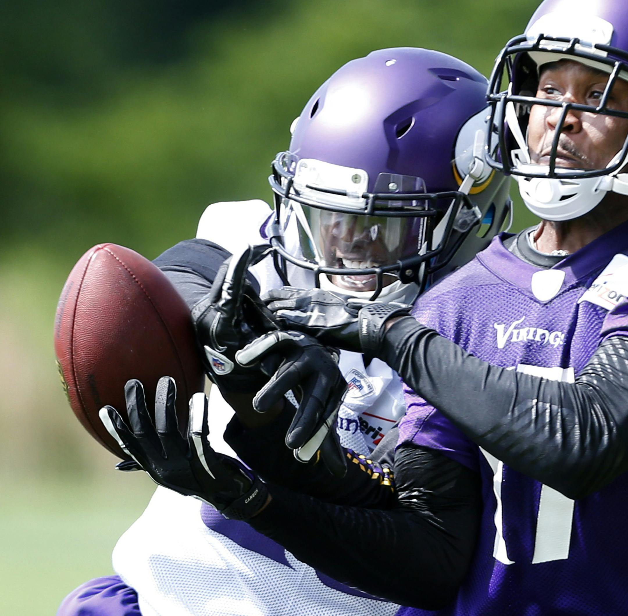 Minnesota Vikings rookie cornerback Xavier Rhodes (29) broke up a pass intended for Stephen Burton (11) during practice on Wednesday. ] CARLOS GONZALEZ cgonzalez@startribune.com June 19, 2013, Eden Prairie, Minn., Winter Park, Minnesota Vikings minicamp ORG XMIT: MIN1306191756058534