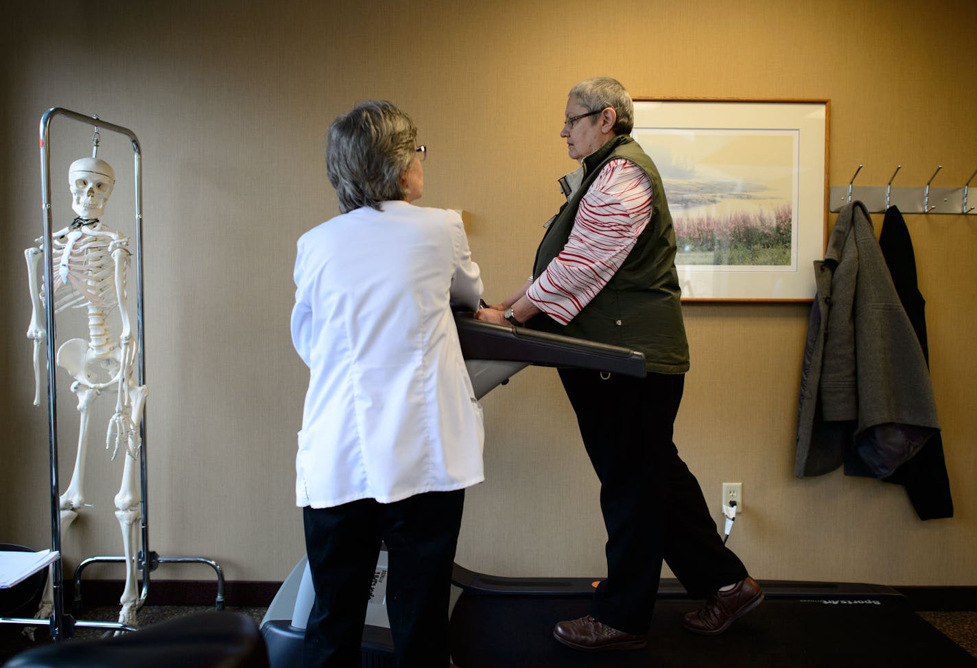 Physical therapist Martha Sullivan worked with cancer patient Jackie Fischer at Courage Kenny Institute in Minneapolis last week
