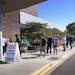 A long line of voters waited to cast their ballots during early voting at Ramsey County Library Friday in Roseville.